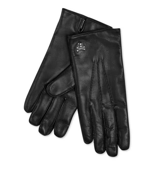 Details maken het verschil. Ontdek de zachtheid van deze nappa handschoenen met de iconische Skull&Bones op een stud. Voering van puur kasjmier.