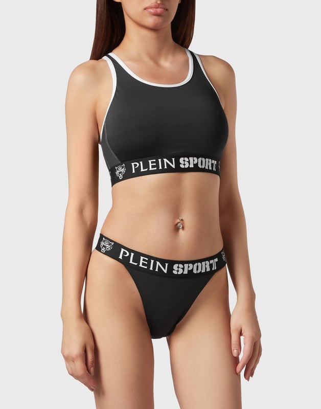 Descubre las características clave del bikini diseñado por el equipo creativo de Plein Sport.   Máxima comodidad y lycra de alto brillo de secado rápido.   Los dobladillos de color en contraste acentúan el talante deportivo de la prenda   Su diseño garantiza la libertad de movimientos y la máxima sujeción   Los tirantes elásticos con Logo tejido jacquard garantizan un ajuste impecable