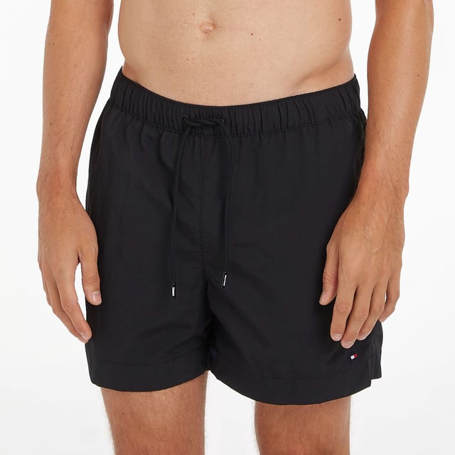 Elasticated drawstring waist.Two side slip pockets.Tommy Hilfiger branding.Tommy Hilfiger flag embroidery on hip.