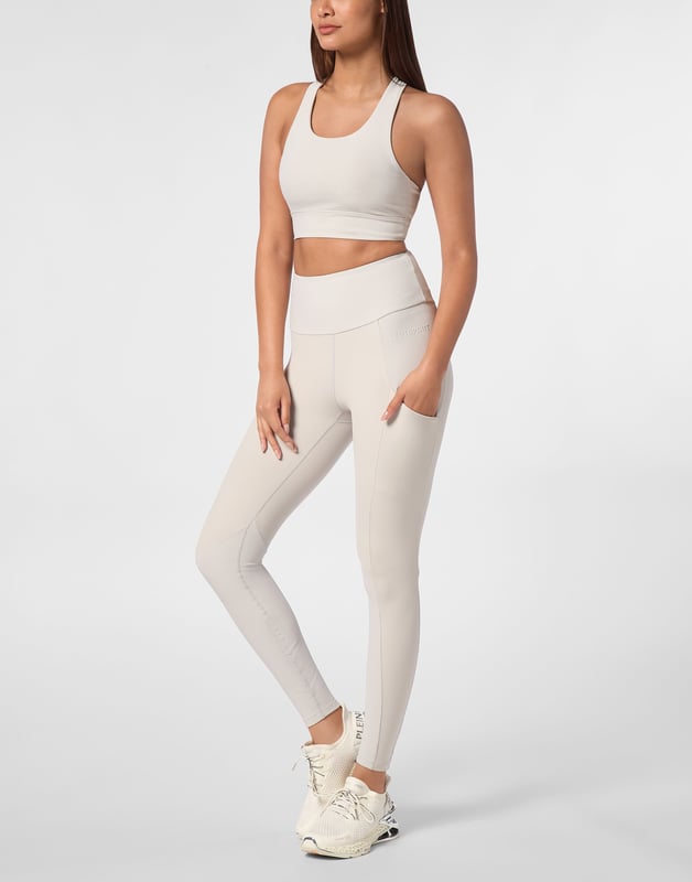 Comfortable and light-weight top designed to help you push your limits.   Maximum comfort and quick dry Lycra®   Triple crisscross straps   Support especially designed for cycling or gym training   Bottom hem grants support and firmness