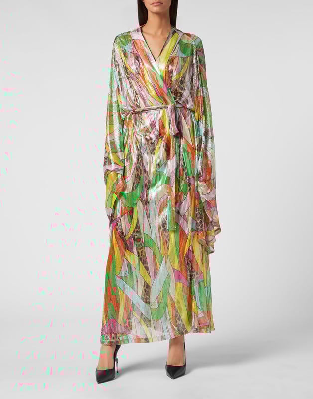 Déjese conquistar por este look Diva: lo hemos diseñado para dar color a su verano. Descubra cómo llevar la nueva versión de un caftán envolvente.   Punto de viscosa de lúrex con estampado de parches multicolor.   Parte delantera anudada   Mangas anchas tipo kimono   Pespunte a dos agujas