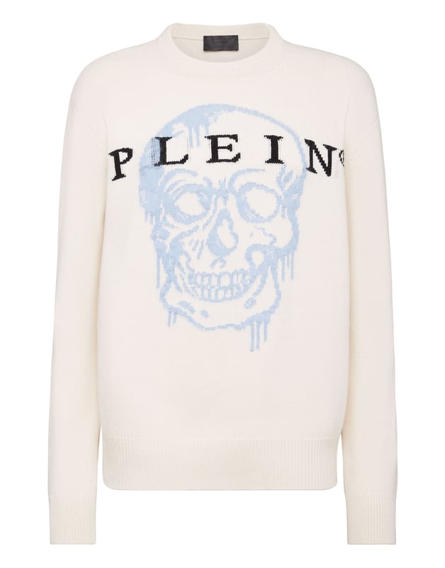 Jersey oversize de lana merina con la incrustación de la Calavera icónica de mohair. Letras de la marca están tejidas en jacquard. Cantos de punto de canalé.