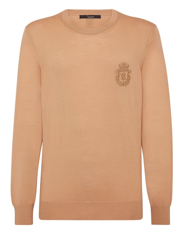 Explore new ways of expressing elegance with this season’s suggestions. Like this knit wool crewneck pullover. Look at the details.   12/14-gauge plain knit extrafine wool   Crest embroidered at left chest   The Brand initial embroidered on the hang loop sewn at yoke   Rib knit hems