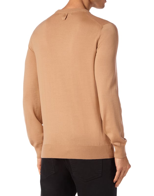 Explore new ways of expressing elegance with this season’s suggestions. Like this knit wool crewneck pullover. Look at the details.   12/14-gauge plain knit extrafine wool   Crest embroidered at left chest   The Brand initial embroidered on the hang loop sewn at yoke   Rib knit hems