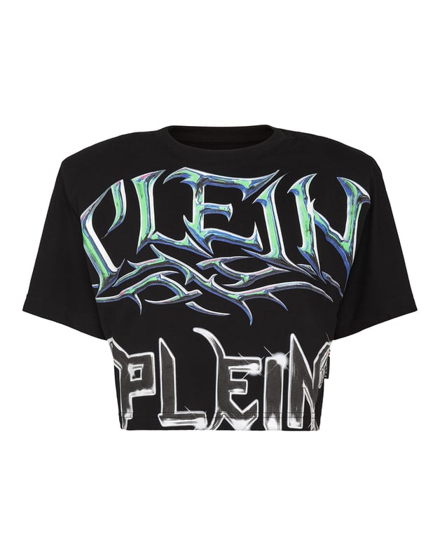 Añade una pizca de singularidad a tus conjuntos con esta camiseta crop de algodón. Fíjese en los detalles.   Punto de algodón   Los estampados de The Brand decoran la parte delantera y trasera   Acolchado en los hombros   Hexágono de PP en un parche de cuero saffiano cosido en el canesú   Escote de punto elástico   Costura a dos agujas    Ajuste: Cropped