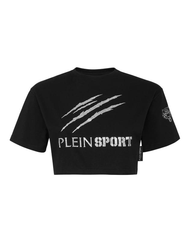 Plein Sport te da la oportunidad de destacar también mientras entrenas duro. Echa un vistazo a esta nueva camiseta crop con inserciones estampadas.   Máxima comodidad gracias a la flexibilidad natural del jersey de algodón elástico   Letras y estampado de purpurina Tiger Scratch en la parte delantera   Escote de punto elástico   Dobladillo inferior de corte crudo.