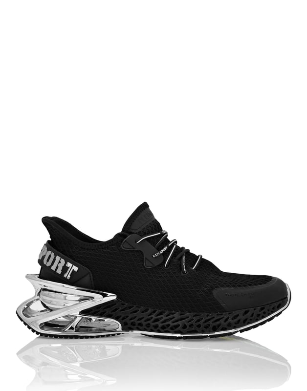 Zapatilla Runner Thunder Force Genx Estas zapatillas Thunder Force Gen X 01 nacen de la creatividad del Plein Sport Lab con el objetivo de conjugar tecnología punta y un diseño único y excepcional. Parte superior dinámica de malla reforzada y goma para una protección integral. Ajuste deslizante para mayor estabilidad y ajuste ceñido Cordones tubulares con logotipo Marca destacada en el contrafuerte del talón y la lengüeta Entresuela ultraligera, ergonómica, de alta tecnología, amortiguadora, perforada y engomada con detalles metálicos Suela exterior perfilada para un agarre óptimo Forro interior