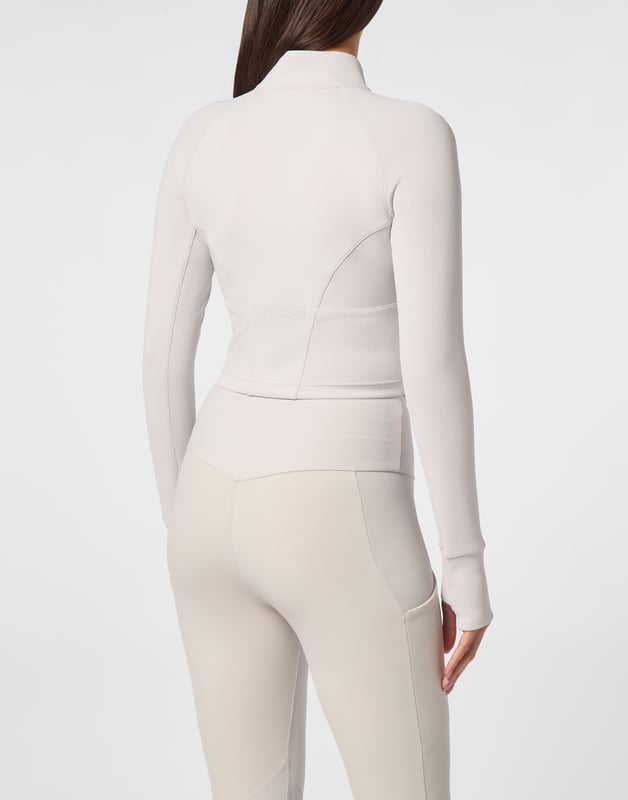 Check out the new jogging jacket making your sports sessions and leisure time stand out.   Stretch technic fleece fabric    Decorative stitching   Zip fastener on jacket   Sleeves with thumbholes