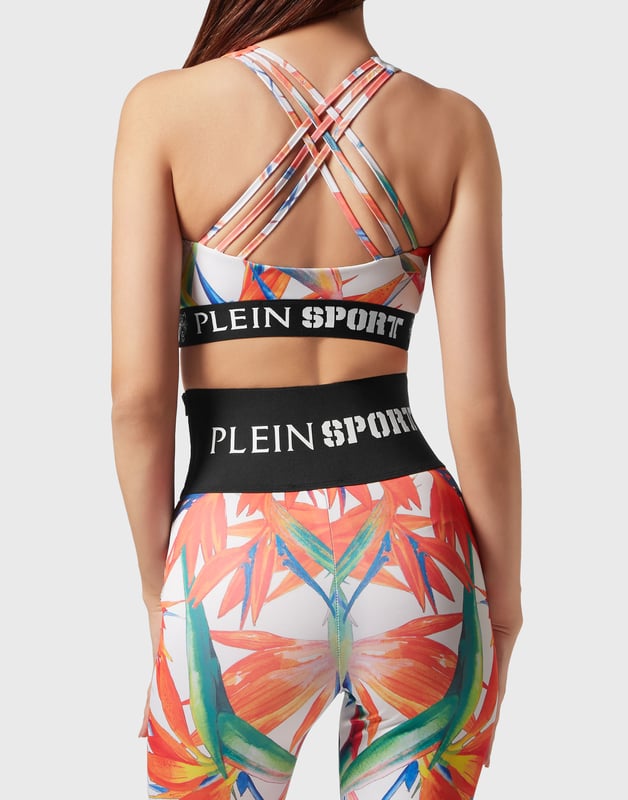 Comfortable and light-weight top designed to help you push your limits.   Maximum comfort and quick dry printed high-shine Lycra®   Triple criss-cross straps   Support especially designed for cycling and gym training   The bottom hem with jacquard woven Logo grants support and firmness