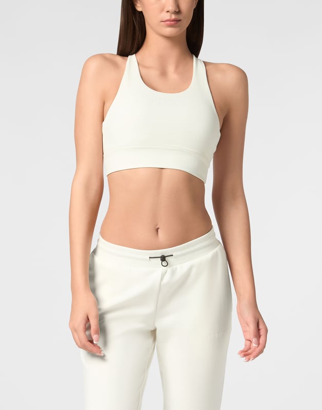 Comfortable and light-weight top designed to help you push your limits.   Maximum comfort and quick dry Lycra®   Triple crisscross straps   Support especially designed for cycling or gym training   Bottom hem grants support and firmness