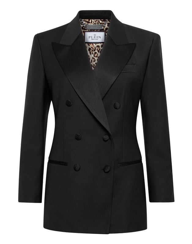 This light wool double brest blazer is a tale of refined elegance. See the care for details.    Light wool   Shiny satin peak lapels   Double breasted with lined buttons with embroidered Logo   Two slit pockets    Back slit    Inner lining   Fit Loose
