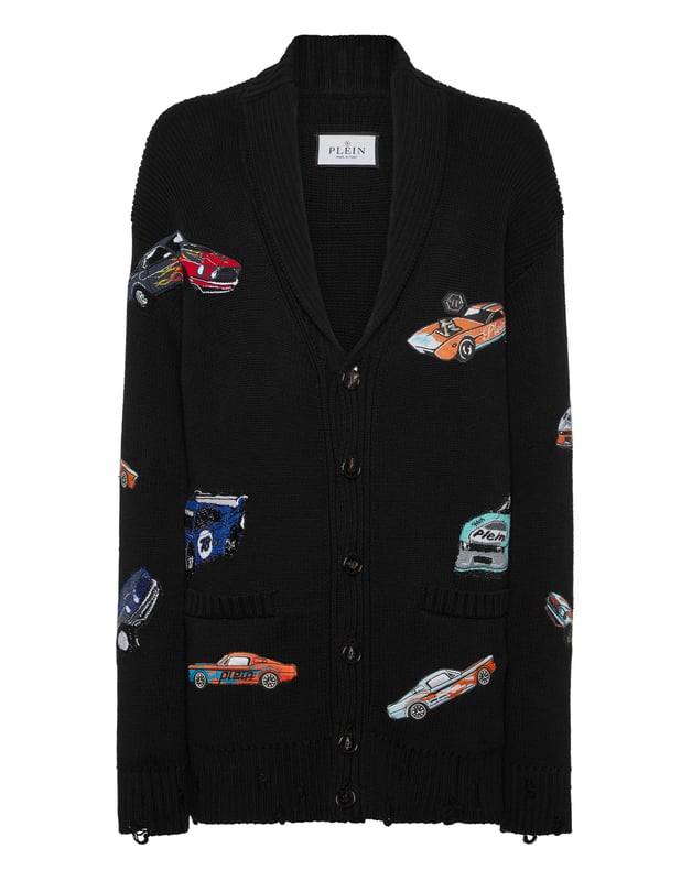 Innovation and creativity are the roots of the style of Plein. Discover the features of this cotton knit cardigan.   5-gauge knit cotton   Embroidered patches sewn all over   Shawl collar    Logoed patch   Buttons fastening    Two patch pockets   Rib knit, raw cut hems