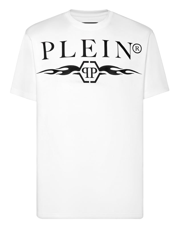 Bold and unapologetic, this round neck t-shirt channels street-luxe energy with graphic flames and signature logo detailing ,  a must-have for statement layering.   Crafted from premium cotton for elevated comfort.   Bold logo and flame artwork create visual impact.   Classic fit ideal for everyday styling.   Hexagon emblem adds a touch of brand identity.   Pairs effortlessly with denim, joggers, or layered under a jacket.