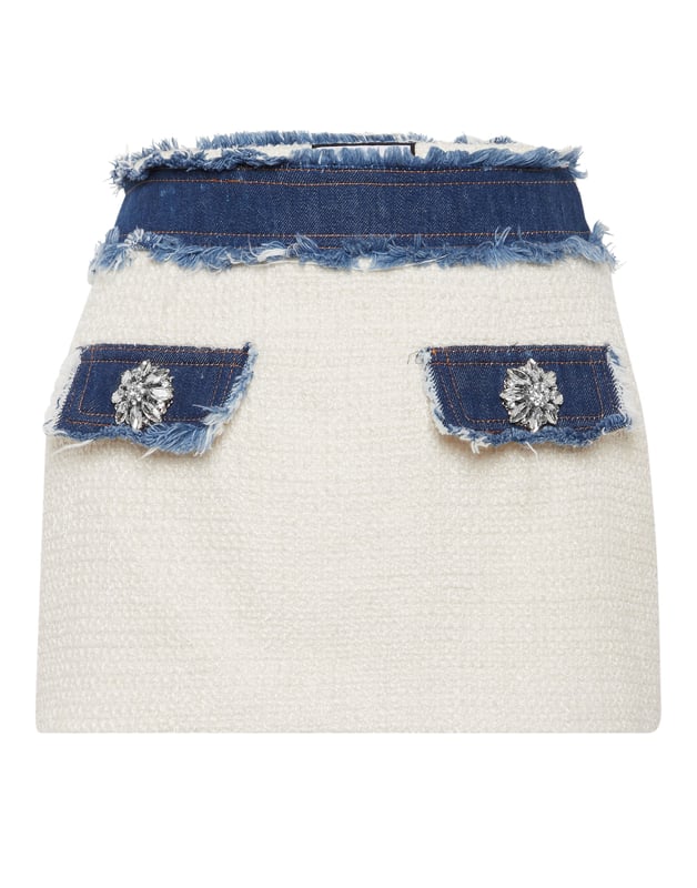 ¿Estilo Chic & Rock? Esta minifalda es solo para ti. Hemos reinventado el tweed según el estilo de Plein. Mire los detalles.   Tweed de mezcla de poliéster con detalles de mezclilla.   Broches grandes de diamantes de imitación   Dos bolsillos falsos   dobladillos con flecos   Cremallera al costado   Forro interior   Ajuste de figura