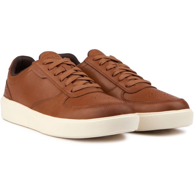 All-day comfort meets classic court style in the Grand Court Transition Sneaker. It's all in style and comfort; these casual sneakers are designed for every day, with a sleek silhouette, premium leather upper, an ultra-cushioned footbed with grand.øs technology, and a durable rubber outsole.