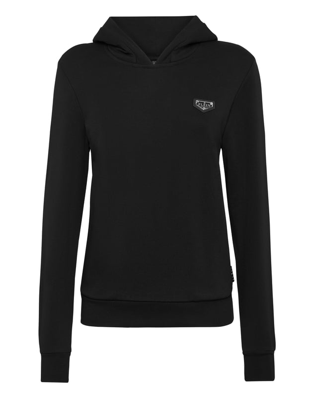 Eleva Tu Estilo Casual con Nuestro Hoodie Elegante  Este hoodie elegante es una adición esencial para tu guardarropa casual. Confeccionado en 100% algodón, combina confort con un toque de audacia, haciéndolo perfecto para cualquier ocasión.    Fresco y Audaz: Cuenta con un parche negro en el pecho que añade un toque único y audaz, distinguiéndolo de los demás.   Confort y Calidez: Fabricado con mangas largas y material 100% algodón para asegurar confort y calidez, ideal para el uso diario.   Toque de Lujo: El icónico logo de Plein en el pecho realza el hoodie con un toque de lujo y sofisticación.   Estilo Versátil: Esta pieza versátil puede vestirse de forma elegante o casual, perfecta para hacer recados o salir con amigos.   Moda y Funcionalidad: Te mantiene viendo y sintiendo genial, ya sea que estés de paseo o relajándote en casa.  Este hoodie está diseñado para ser un elemento básico en tu colección casual, ofreciendo tanto estilo como practicidad para adaptarse a tu estilo de vida.