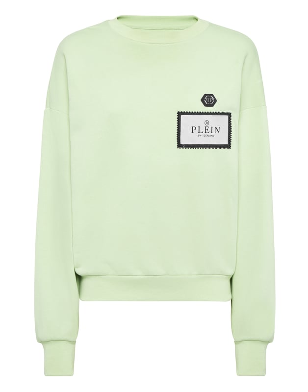 Define your style with a dash of personality. Check out this fleece crewneck with distinctive details.   Soft cotton fleece   Logoed label sewn at left chest   Logoed badge sewn at left chest   Rib knit hems   Fit: Over