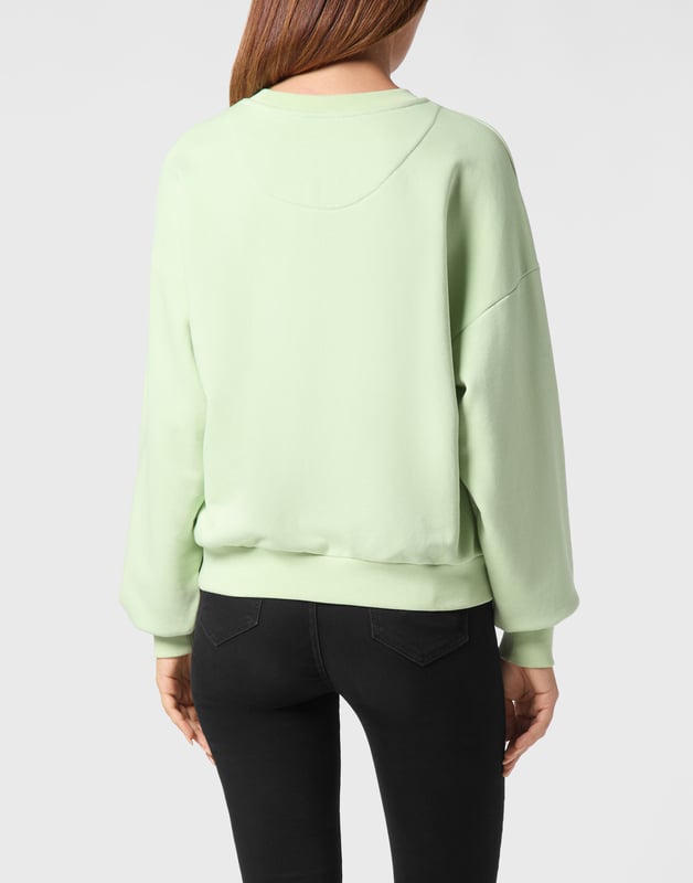 Define your style with a dash of personality. Check out this fleece crewneck with distinctive details.   Soft cotton fleece   Logoed label sewn at left chest   Logoed badge sewn at left chest   Rib knit hems   Fit: Over