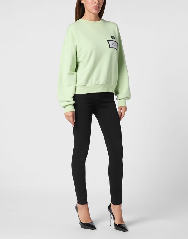 Define your style with a dash of personality. Check out this fleece crewneck with distinctive details.   Soft cotton fleece   Logoed label sewn at left chest   Logoed badge sewn at left chest   Rib knit hems   Fit: Over