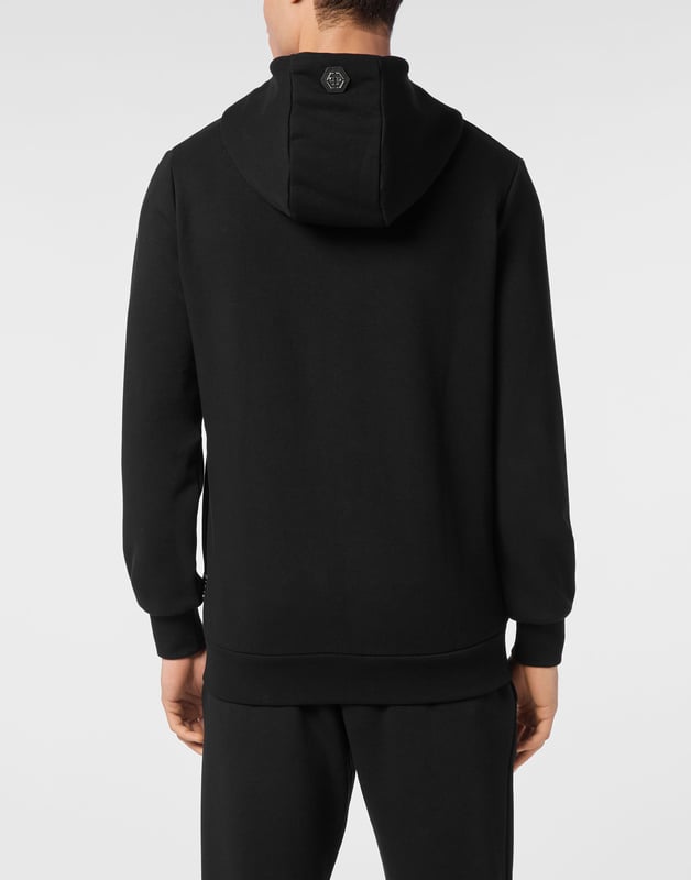 Discover the originality of this hoodie jacket made from a cotton-blend fleece, featuring padded inserts and details.   Soft cotton-blend fleece     Pattern printed at left chest     Zip fastening   Two slit pockets     Logo patch sewn on the hood     Rib knit hems   Fit: Regular