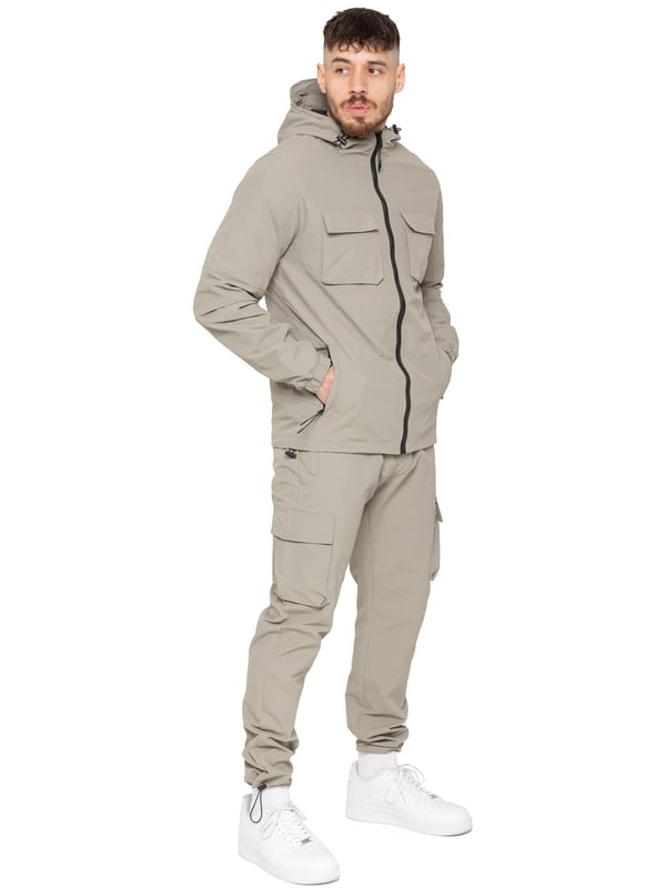 Stay ready for anything with the Enzo Milano Men’s Cargo Pants. Made from lightweight, poly fabric, these straight-leg trousers feature a regular fit, elasticated waistband with adjustable drawstring, and drawstring hems for a custom fit. With two Velcro-fastened side cargo pockets and a back welt pocket, they offer secure, practical storage. Perfect for everyday wear, travel, or outdoor use, these men’s cargo pants combine comfort, function, and style.