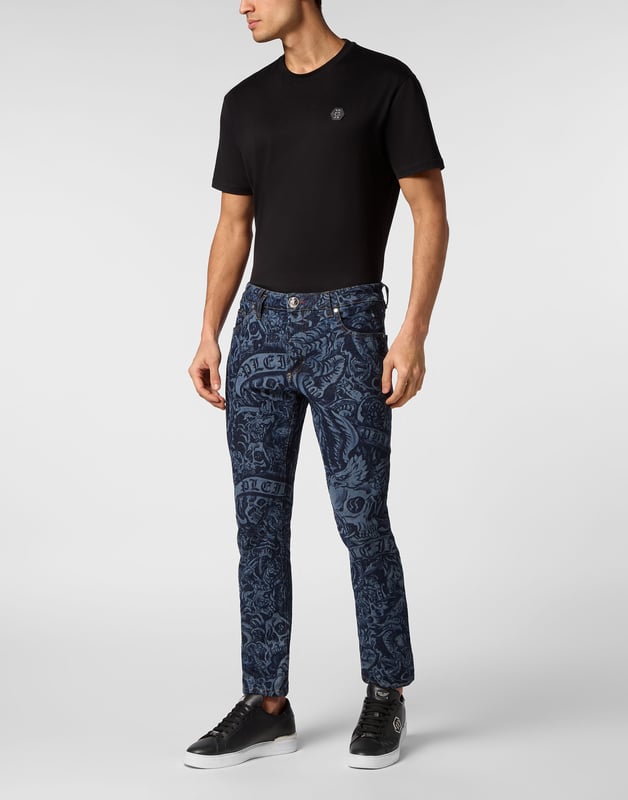 Escape the routine and pick something really unique, like these printed denim 5 pocket pants.                                                                 All over laser printed denim with Tattoo pattern   Patchwork with striking seams   Single metal button   PP Hexagon on a saffian leather badge sewn on the right rear pocket   Fit: Skinny