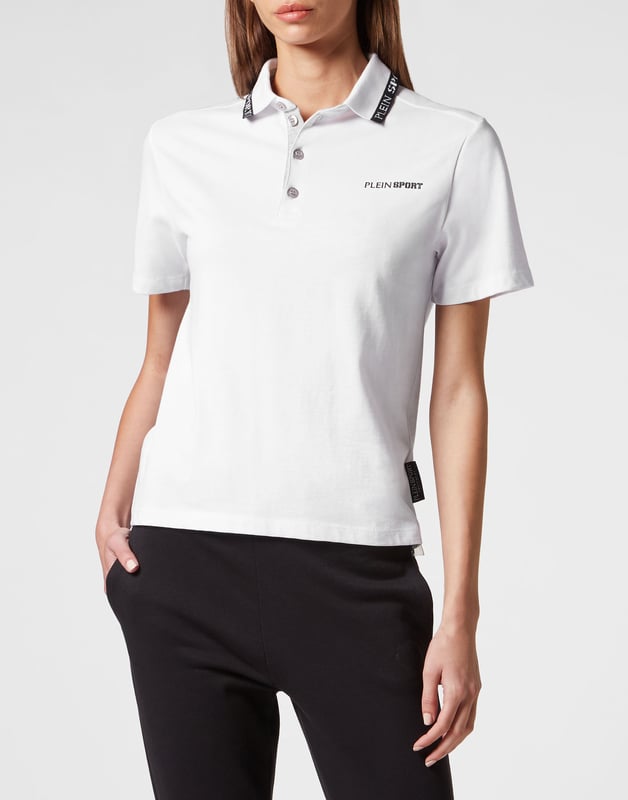 Check out the comfort of this polo shirt, great for a tennis match or on a golf course.   Maximum comfort thanks to the natural flexibility of cotton jersey   Logoed buttons   Rib knit contrasting colored collar and cuffs   Brand print at left chest   Two-needle stitching bottom hem   Figure fitting