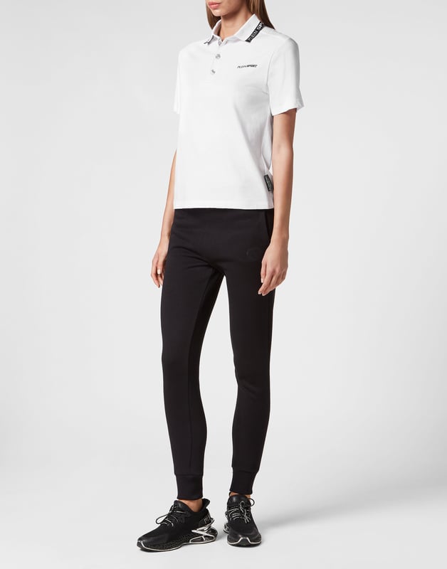 Check out the comfort of this polo shirt, great for a tennis match or on a golf course.   Maximum comfort thanks to the natural flexibility of cotton jersey   Logoed buttons   Rib knit contrasting colored collar and cuffs   Brand print at left chest   Two-needle stitching bottom hem   Figure fitting
