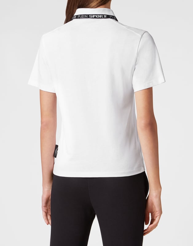 Check out the comfort of this polo shirt, great for a tennis match or on a golf course.   Maximum comfort thanks to the natural flexibility of cotton jersey   Logoed buttons   Rib knit contrasting colored collar and cuffs   Brand print at left chest   Two-needle stitching bottom hem   Figure fitting