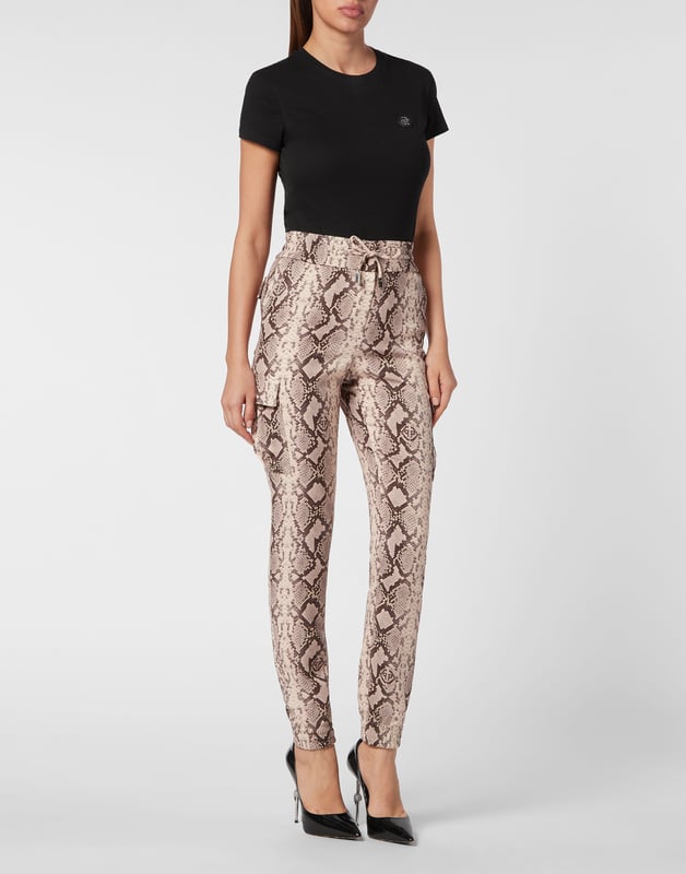 Dare to be edgy with these satin jogging-cut cargo trousers.   Python print satin   Two cargo pockets sewn at legs   Slit pockets   Logoed metal badge on the back   Waistband with stop-cord drawstring   Elasticated hems