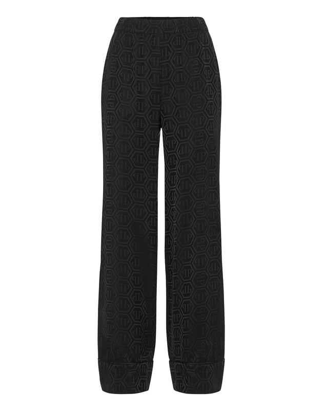 Trousers Monogram Rediscover the meaning of simple elegance with this silk pijama pant. Check out the details. Silk fabric with jacquarded monogram Elastic waistband Edges with piping