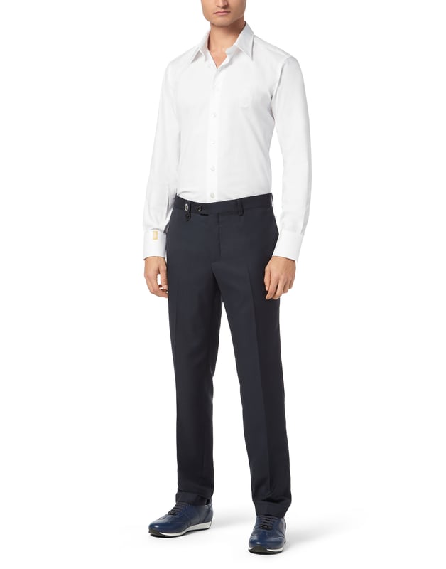 Classic-cut trousers are a must-have that all mens wardrobes should have. We recommend this woven wool model. Discover all their features.   Partridge eye wool fabric   Button fastening waistband   Stud on belt loop   Welt pockets   Turn-up cuffs