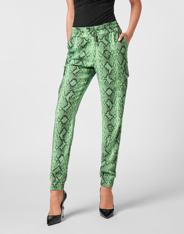 Dare to be edgy with these satin jogging-cut cargo trousers.   Python print satin   Two cargo pockets sewn at legs   Slit pockets   Logoed metal badge on the back   Waistband with stop-cord drawstring   Elasticated hems