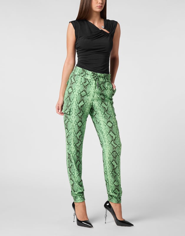 Dare to be edgy with these satin jogging-cut cargo trousers.   Python print satin   Two cargo pockets sewn at legs   Slit pockets   Logoed metal badge on the back   Waistband with stop-cord drawstring   Elasticated hems