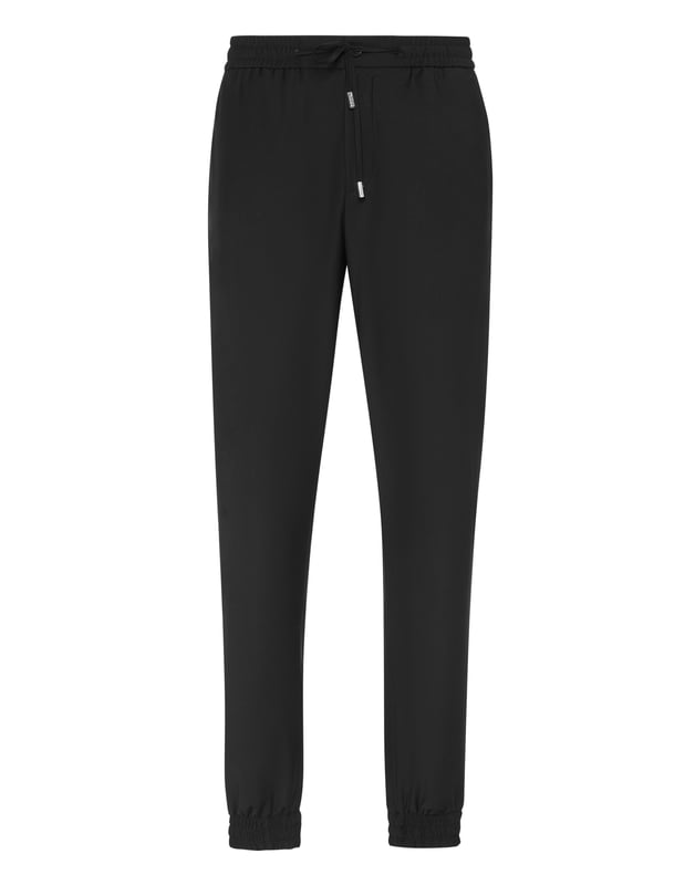 Refina tu ropa de ocio con estos pantalones de chándal de corte impecable, que combinan la lujosa suavidad de la lana virgen con la elegancia contemporánea.   Confeccionados en una mezcla de lana de primera calidad para un confort y una flexibilidad excepcionales.   Silueta relajada pero refinada perfecta para un estilo casual de lujo.   Forro suave que garantiza una mayor comodidad y transpirabilidad.   Fácil de combinar con elegantes zapatillas o calzado informal de lujo.   La artesanía característica de Philipp Plein fusiona ocio y sofisticación sin esfuerzo.
