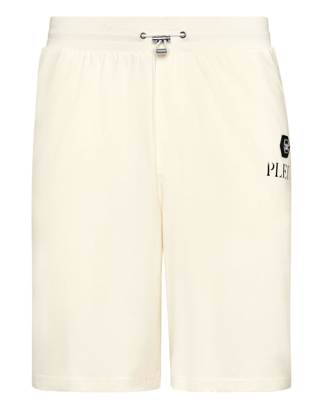 Ontdek de originaliteit van deze joggingbroek van gemêleerd katoenfleece versierd met unieke details.   Gemengd katoenen fleece   Oud verfeffect   Opdruk met logo   Steekzakken   Geribde tailleband met tunnelkoord