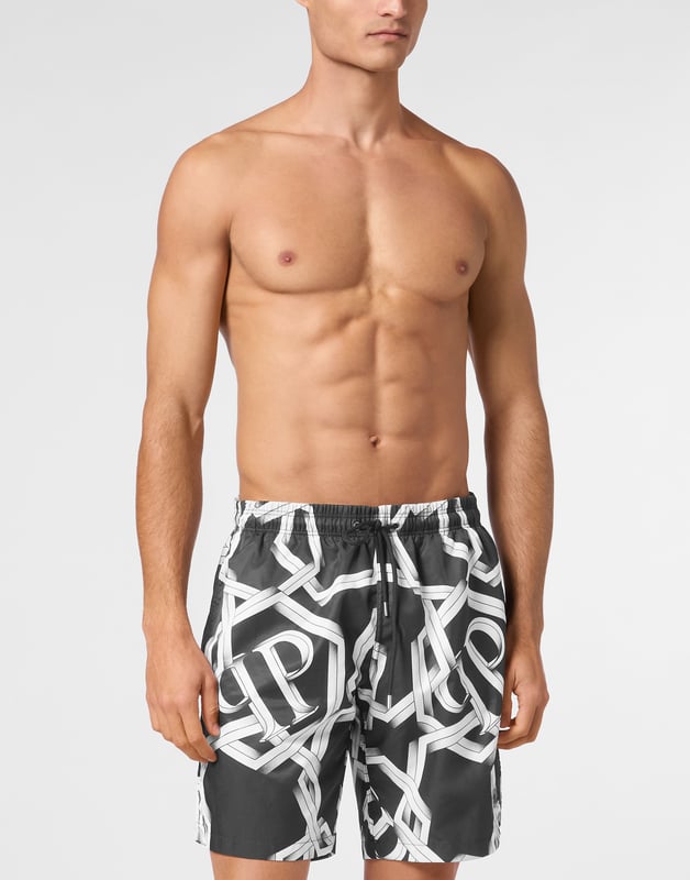 Customize also your free time look. We suggest these swimming boxers featuring the iconic Logo printed all-over.   Logo-print nylon   Elasticated waistband with drawstring   Rubber patch with PP Hexagon sewn on the left leg   Two slit pockets and one on the back   Mesh inner lining
