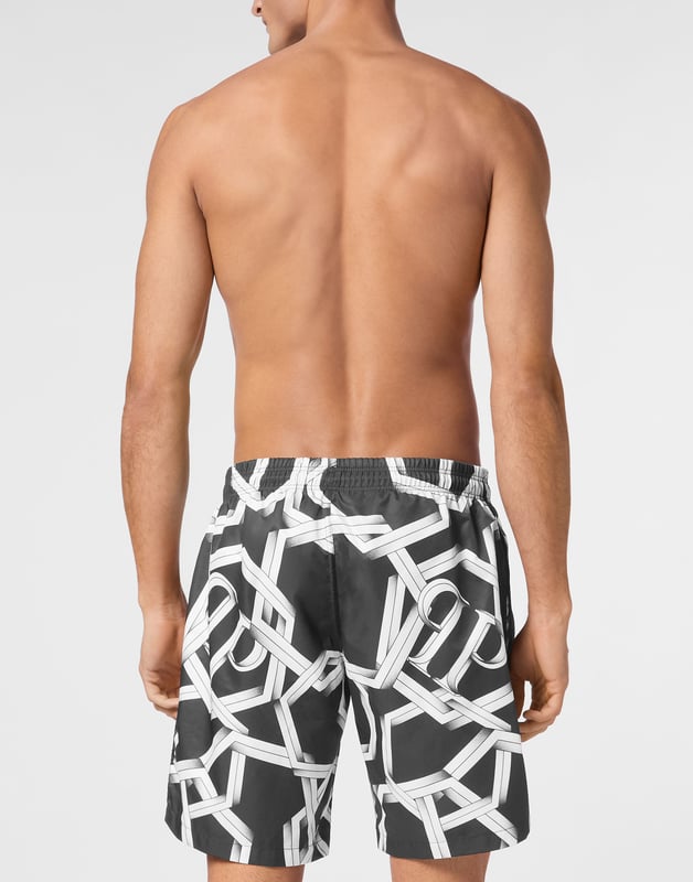 Customize also your free time look. We suggest these swimming boxers featuring the iconic Logo printed all-over.   Logo-print nylon   Elasticated waistband with drawstring   Rubber patch with PP Hexagon sewn on the left leg   Two slit pockets and one on the back   Mesh inner lining