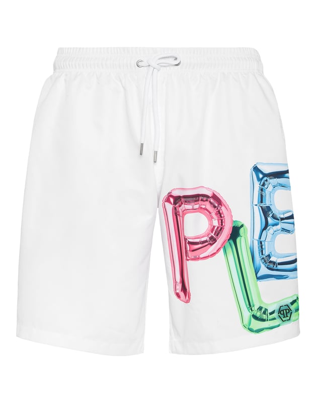 Personalice también su look de tiempo libre. Le proponemos estos boxers de natación con letras impresas en 3D.    Nylon con estampado de la marca en 3D    Cintura elástica con cordón de ajuste    Parche de goma con hexágono de PP cosido en la pierna izquierda    Dos bolsillos con aberturas    Forro interior de malla