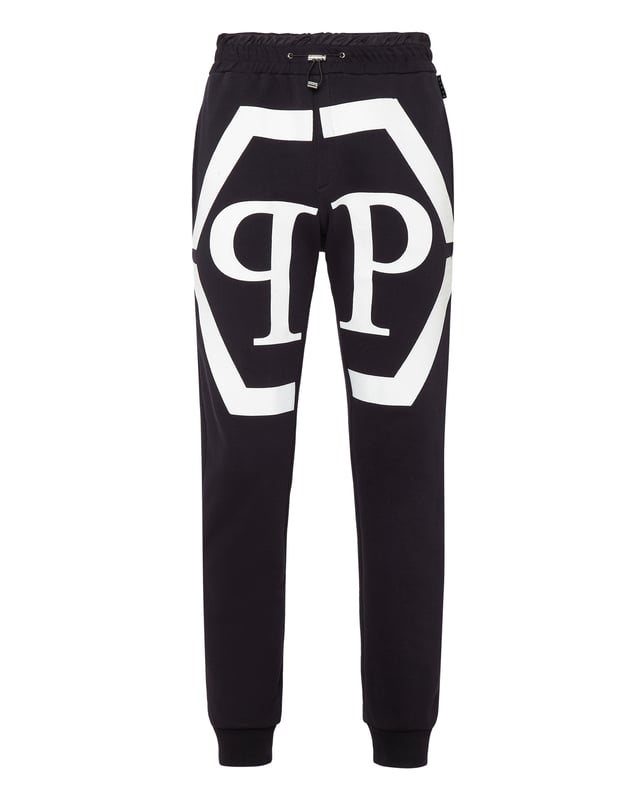 "Eleva tu estilo casual con estos pantalones de algodón que presentan un llamativo logo hexagonal impreso en los muslos. Diseñados para comodidad y estilo, estos pantalones de algodón son perfectos para agregar un toque distintivo de marca a tu vestuario diario."   Tela de algodón suave y transpirable Logo hexagonal impreso llamativo en los muslos Diseñados para comodidad y estilo Perfectos para un look casual de todos los días