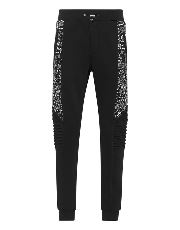 No descuida su tiempo libre. Hemos diseñado estos joggers de forro polar de algodón con motivos Paisley.   Forro polar de algodón suave con estampado Paisley    Hexágono PP en una insignia de cuero saffiano cosida en el lado izquierdo   Bolsillos con aberturas   Cintura con cordón de ajuste   Dobladillos de punto elástico