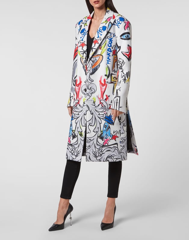 Geef je look een vleugje pure originaliteit. Doe het met deze lange overjas van polyester canvas met Graffiti-print. Verborgen knoopsluiting. Twee paspelzakken. Binnenvoering.