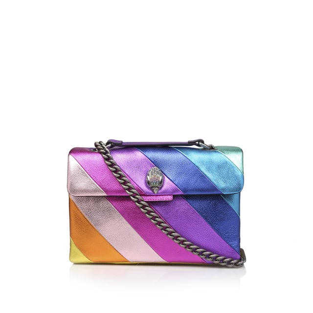 Kurt Geiger London Leather Leather Kensington Bag The Leather Kensington Bag is crafted from soft metallic laminated pebble grain cow leather with iconic rainbow sewn stripe pattern. The antiqued silver Eagle head features rainbow coloured crystals and black crystal eyes on the front flap. 17cm (H), 26cm (L), 8cm (D). Strap drop cross body: 111cm. Strap drop shoulder: 64cm.