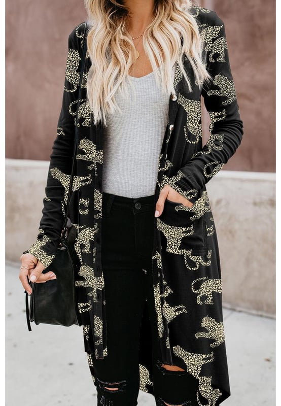 Black printed animal print design
  Ribbed knit texture
  Comfortable fit for layering
  High
  quality materials
  Versatile design for easy pairing