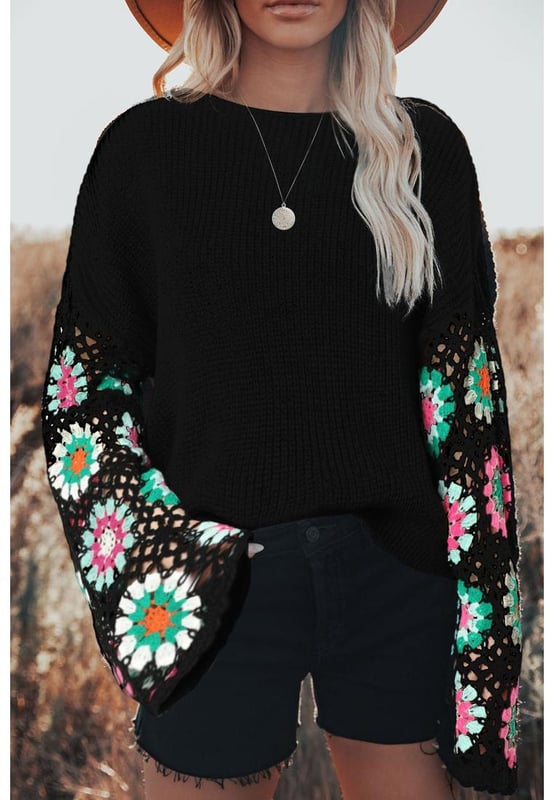 Black floral crochet bell sleeve loose sweater
  Made with high
  quality materials
  Relaxed fit
  Intricate floral crochet detailing
  Trendy bell sleeves
  Versatile piece that can be dressed up or down
  Suitable for any occasion