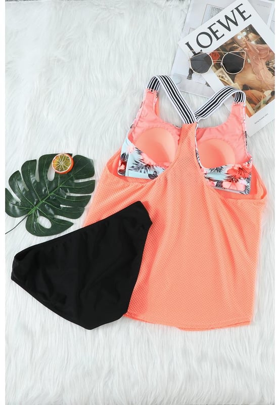 This tankini swimsuit includes the tankini top and panty
  The swim top has a scoop neck sleeveless and racerback design
  Printed bra lining splicing with mesh fabric
  You can wear the top and bottoms together or separate
Material: 82% Nylon 18% Spandex