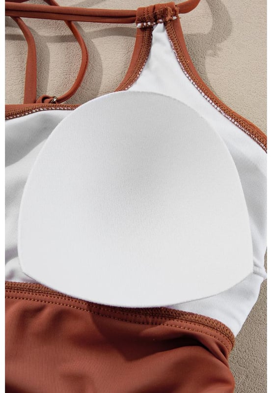 Our styles are designed with a trendy fitted look in mind following an international size standard. For the best fit we suggest choosing one size up from your usual. Be sure to check our sizing chart to find your perfect match!
  Color block design for the tankini top
  Strappy back and drawstring sides
  Matching floral print swim shorts
  Available in multiple colors and sizes
  High elasticity for a comfortable fit
Material: 82% Polyamide 18% Elastane
