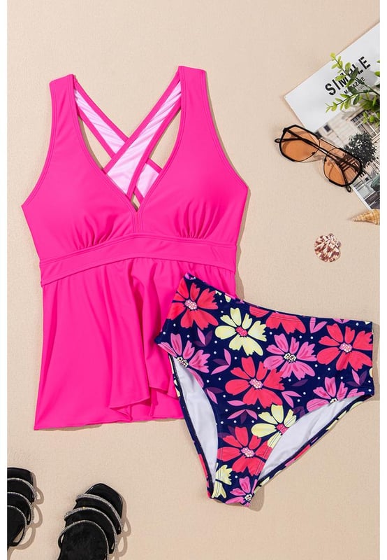 Our styles are designed with a trendy fitted look in mind following an international size standard. For the best fit we suggest choosing one size up from your usual. Be sure to check our sizing chart to find your perfect match!
  Floral tankini set for a fun and feminine look
  Flattering V
  neckline for added elegance
  Trendy crisscross back design for style and support
  Ruffled hem on the bottom for a playful touch
  Two
  piece set for versatile beach fashion
Material: 82% Polyamide 18% Elastane