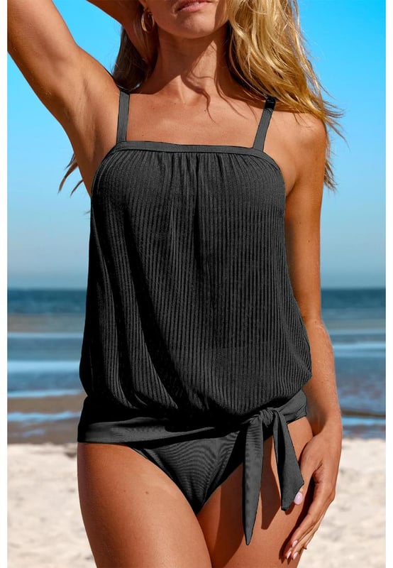 Trendy Black Striped Mesh Knotted Hem Tankini Swimsuit
  High
  rise design for easy wear
  Adjustable straps and removable padded cups for customizable support
  Versatile and functional for any beach or pool day
  Available in sizes S to 2XL with high elasticity
  Refer to the size chart for accurate sizing
Material: 82% Polyamide 18% Elastane