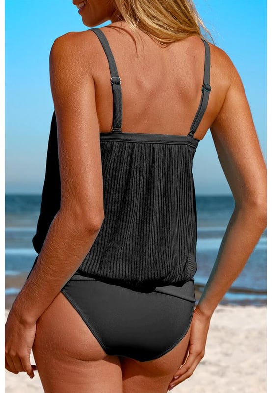 Trendy Black Striped Mesh Knotted Hem Tankini Swimsuit
  High
  rise design for easy wear
  Adjustable straps and removable padded cups for customizable support
  Versatile and functional for any beach or pool day
  Available in sizes S to 2XL with high elasticity
  Refer to the size chart for accurate sizing
Material: 82% Polyamide 18% Elastane